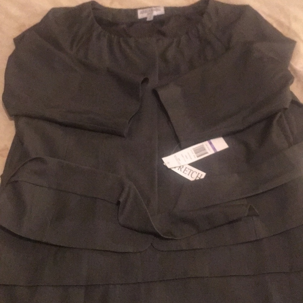 An olive skirt and blouse skirt suite. Size 18